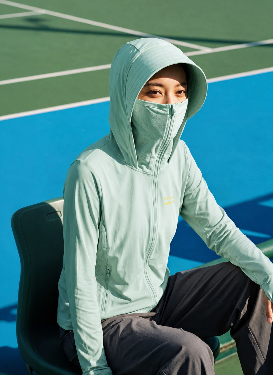 グリーンのNEKONI UV HOODIE・NEKONIWAアンガ柄